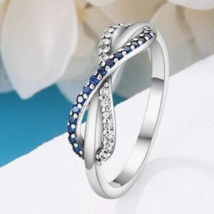 Sterling Silver Infinity Ring with Blue and White Stones Stamped 925 Size 6